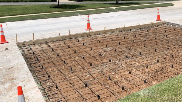 Forms set with rebar on chairs