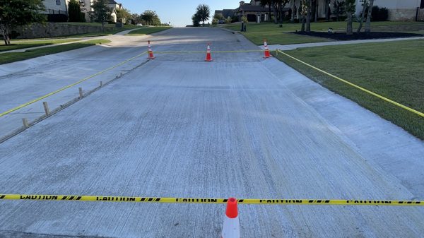 Finished street paving taped off and cleaned up