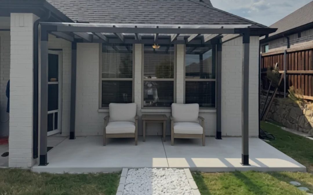 Finished backyard patio with a pergola and seating