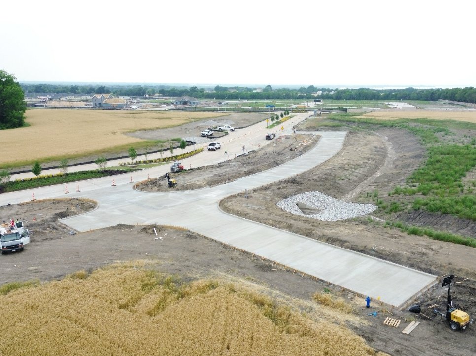 Aerial view of new street paving in a Lavon subdivision